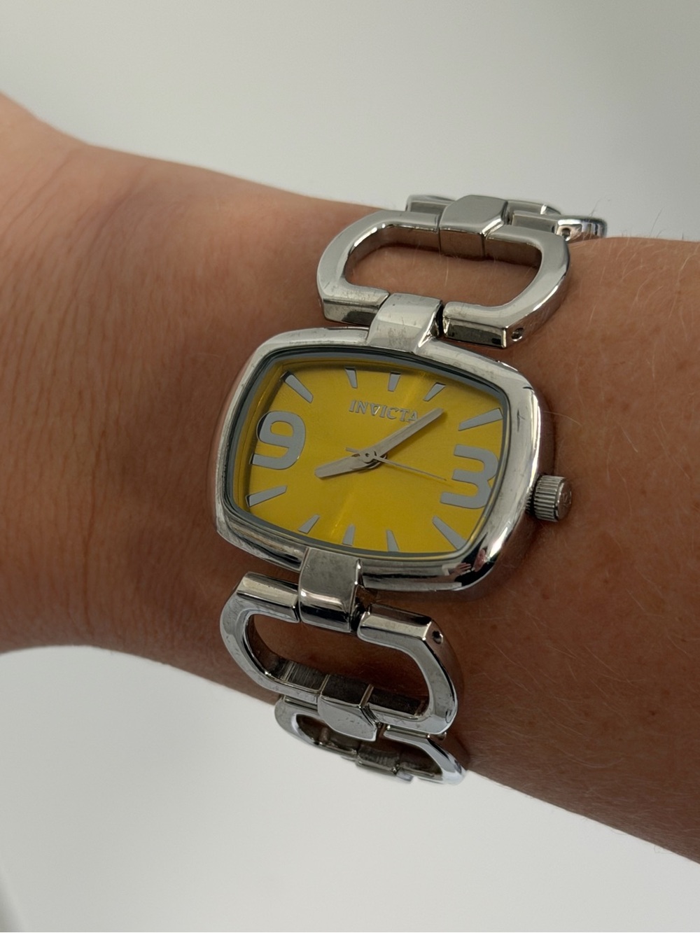 Vintage Invicta Silver Watch with Yellow Dial